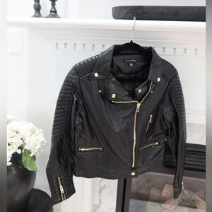 Love Tree, Black leather jacket with gold accents